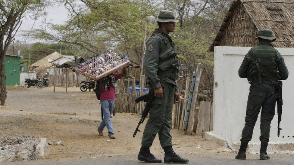 Venezuelan soldiers patrol the Colombian border