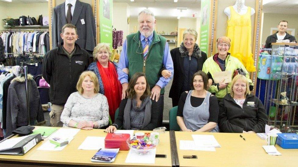 Terry Waite, president of homelessness charity Emmaus UK, visits the charity's shop in Bridgend