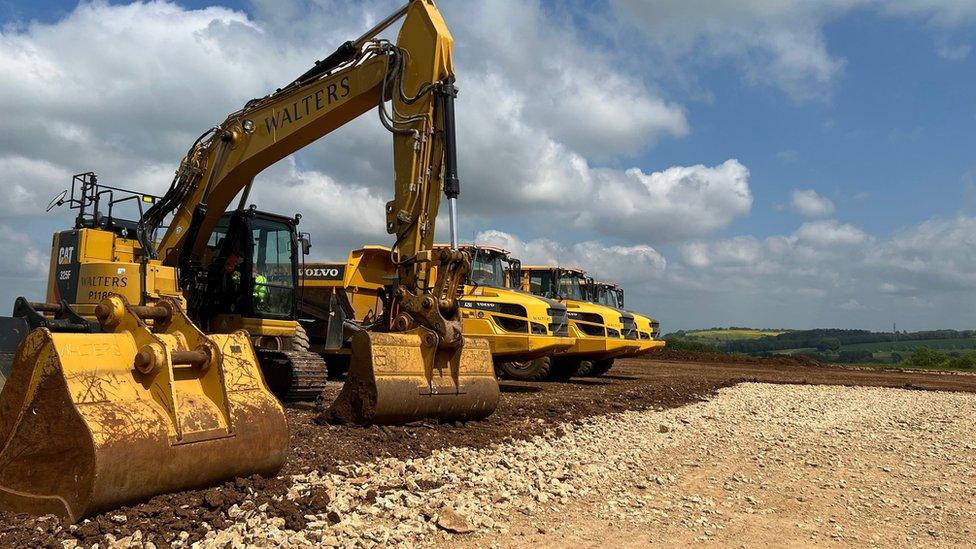 Excavators at building site