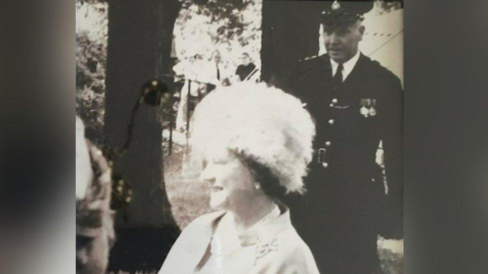 Chris' grandfather with Queen Elizabeth