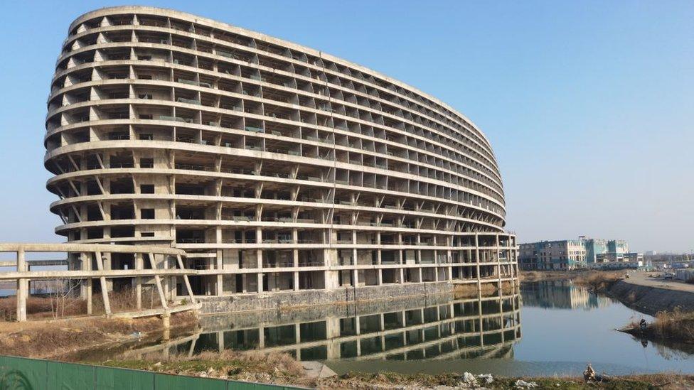 An unfinished five-star hotel is seen in Huai 'an City, Anhui Province, China, 20 February 2023.