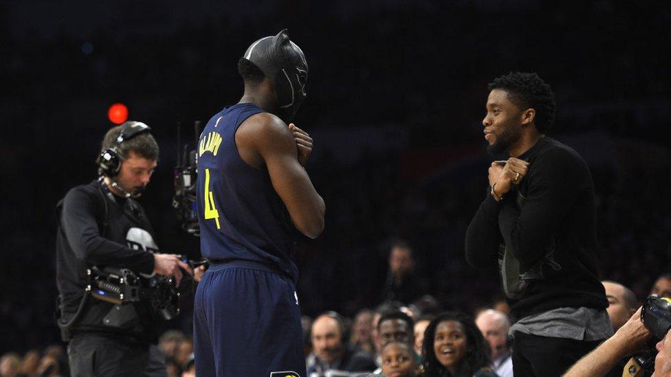 Victor Oladipo and Chadwick Boseman