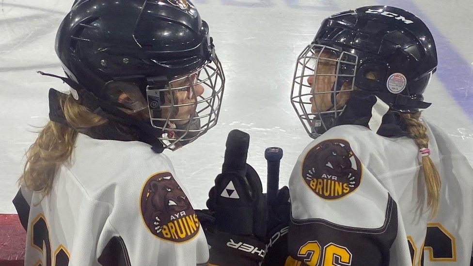 Rebecca and Charlotte Rumsby in their hockey gear