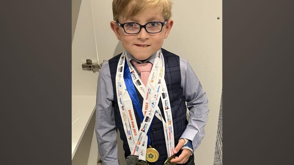 William with medals won at the British Transplant Games 2023