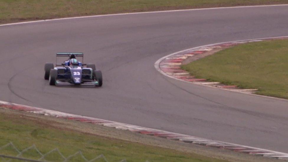 Billy Monger in action on a race track