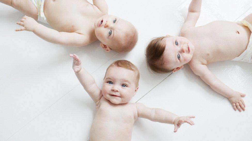 Babies lying on the floor