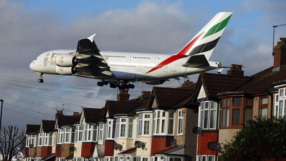 Plane landing over houses near Heathrow Airport