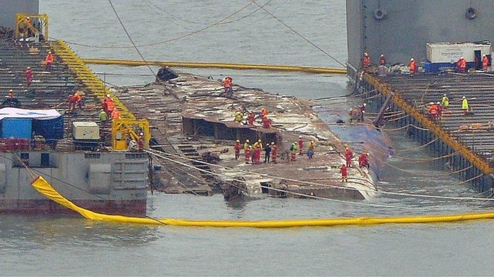 In this handout photo released by Hankook Daily, a submersible vessel attempts to salvage sunken Sewol ferry in waters off Jindo, on March 22, 2017 in Jindo-gun, South Korea.