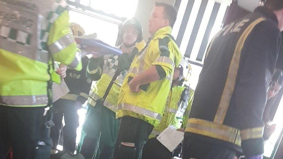 Passengers and emergency services congregated in the Cote Brasserie opposite the station