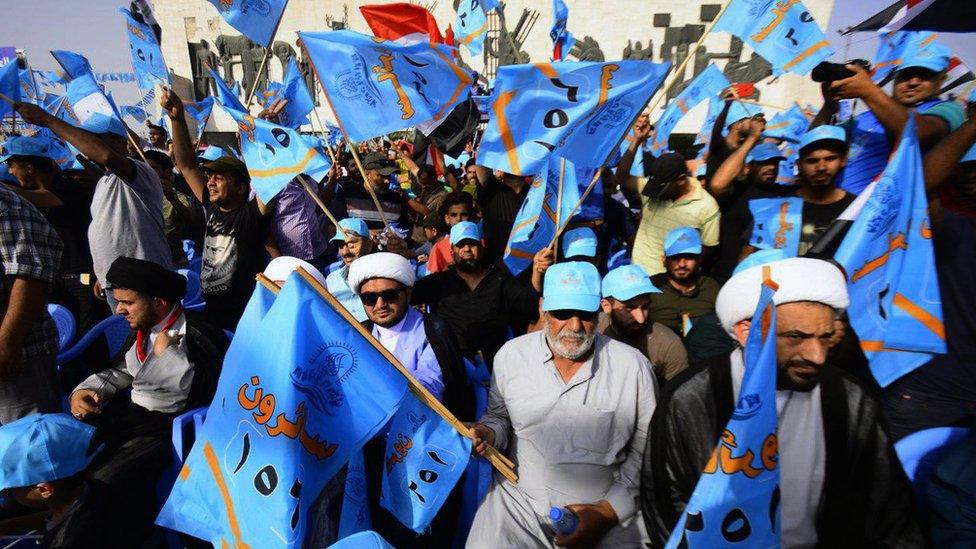 A supporters of Iraqi cleric Moqtada Sadr at a rally in Baghdad (4 May 2018)