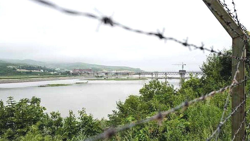 Fences run along the Tumen river