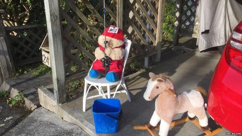 Chester the teddy bear fishing with his horse