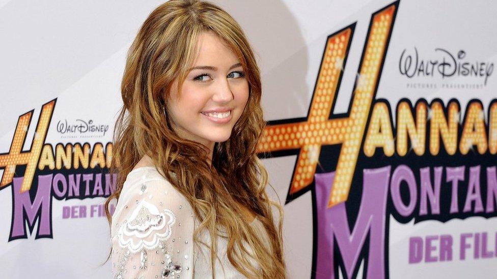 Miley Cyrus as Hannah Montana