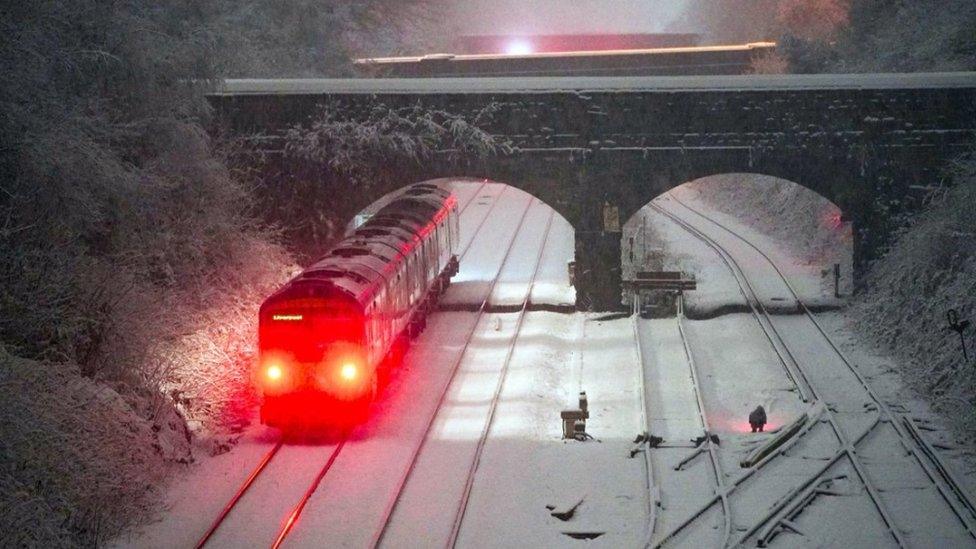 Snow falls at Hunt Cross station, Liverpool