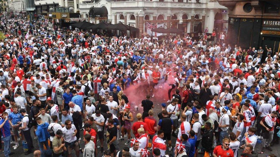 England fans in Leicester Square in central London