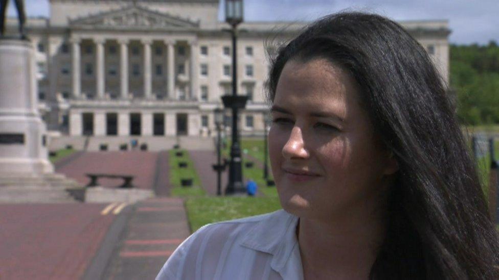 Claire Sugden standing outside Stormont's Parliament Buildings