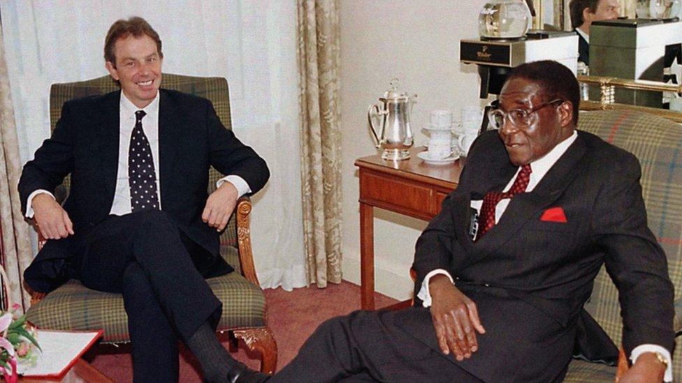 Tony Blair and Robert Mugabe in 1997