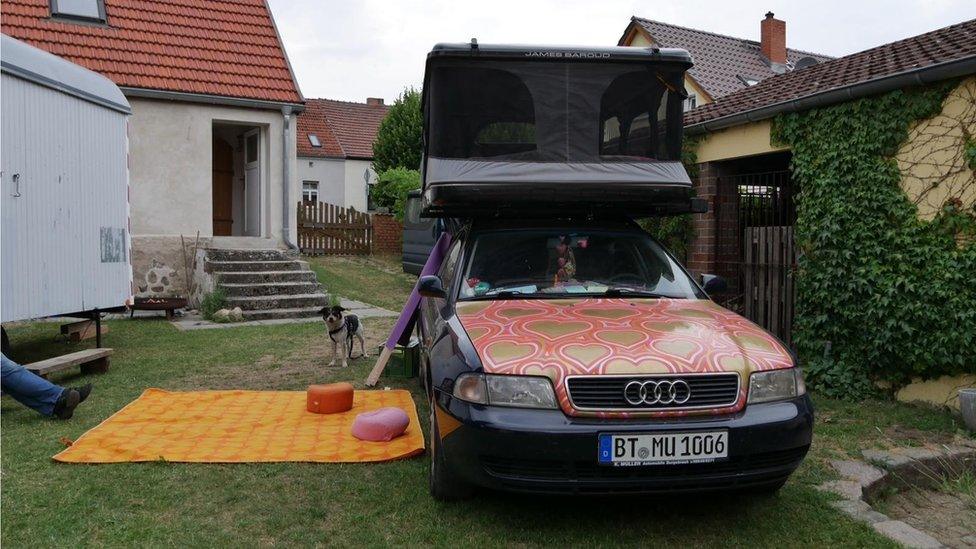 The couple painted their car before setting out on the road