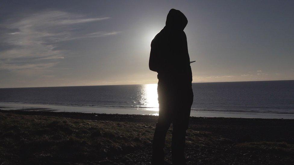 Khalil on a beach