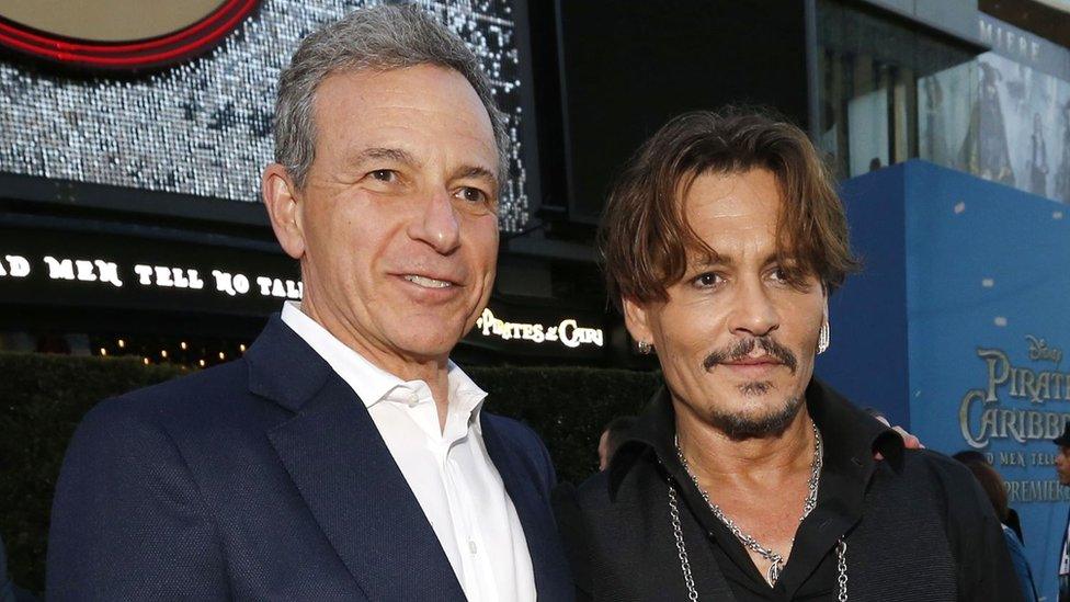 Bob Iger and Johnny Depp