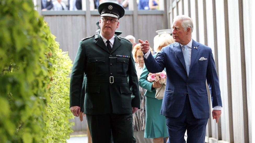 The Prince accompanied by George Hamilton