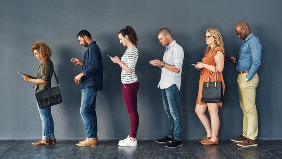 People standing in a queue