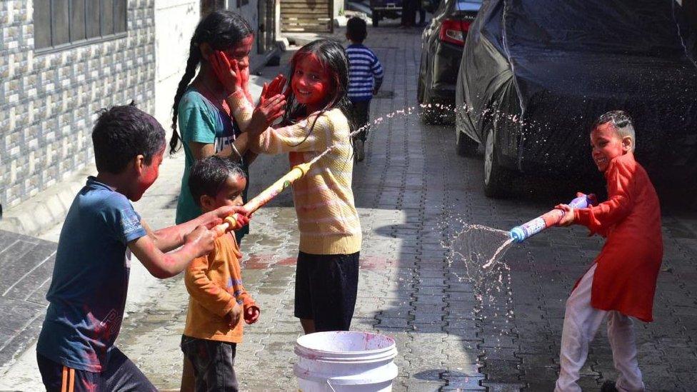 Children in Amritsar, Punjab playing Holi