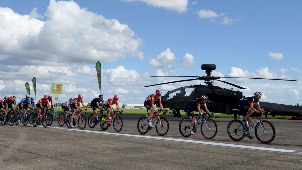 Handout photo provided by Army/Corporal Andy Reddy RLC of Apache attack helicopters made way for bicycles today (Sat 12th Sept) as the Aviva Tour of Britain sprinted down the runway at Wattisham Flying Station. PRESS ASSOCIATION Photo.