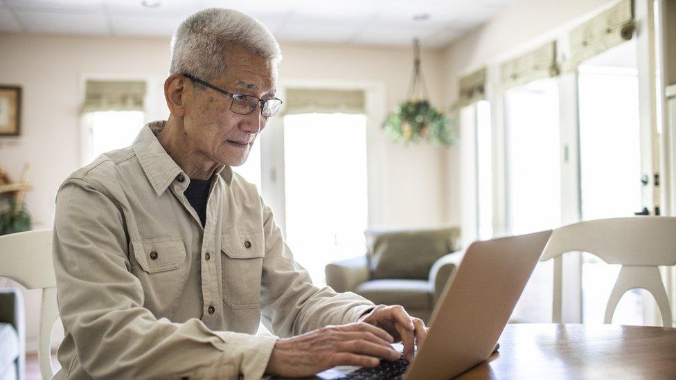 Older internet user stock photograph