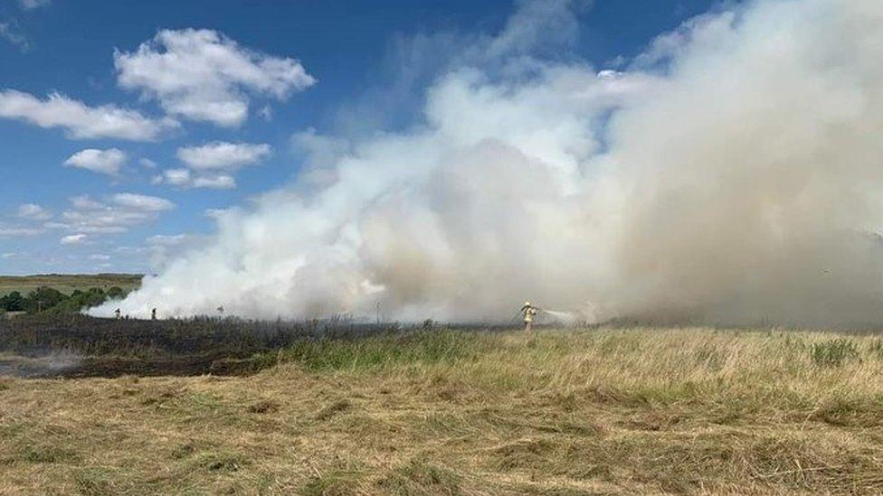 Firefighters tackling field fire near to Rushton, Northamptonshire