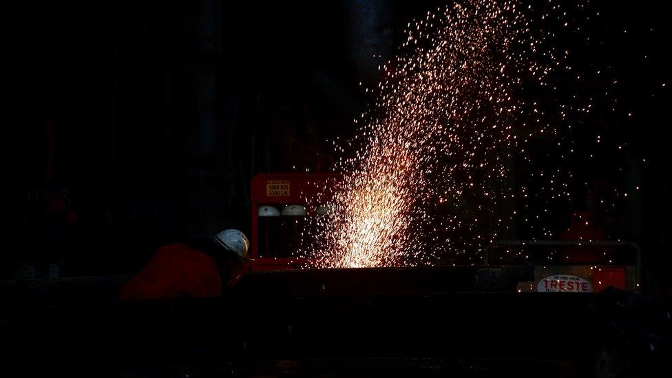 Oxy-acetylene cutting equipment in use