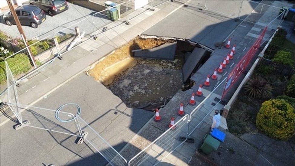 The Bexleyheath sinkhole with police looking on and cordons in place