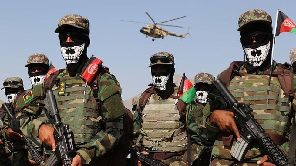 Afghan special force commando unit officers and soldiers attend a graduation ceremony at the military academy in Kabul, Afghanistan