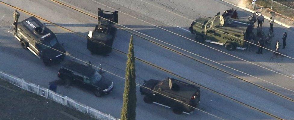 An SUV with its windows shot out that police suspect was the getaway vehicle from the scene of a shooting in San Bernardino, California is shown in this aerial photo December 2, 2015.