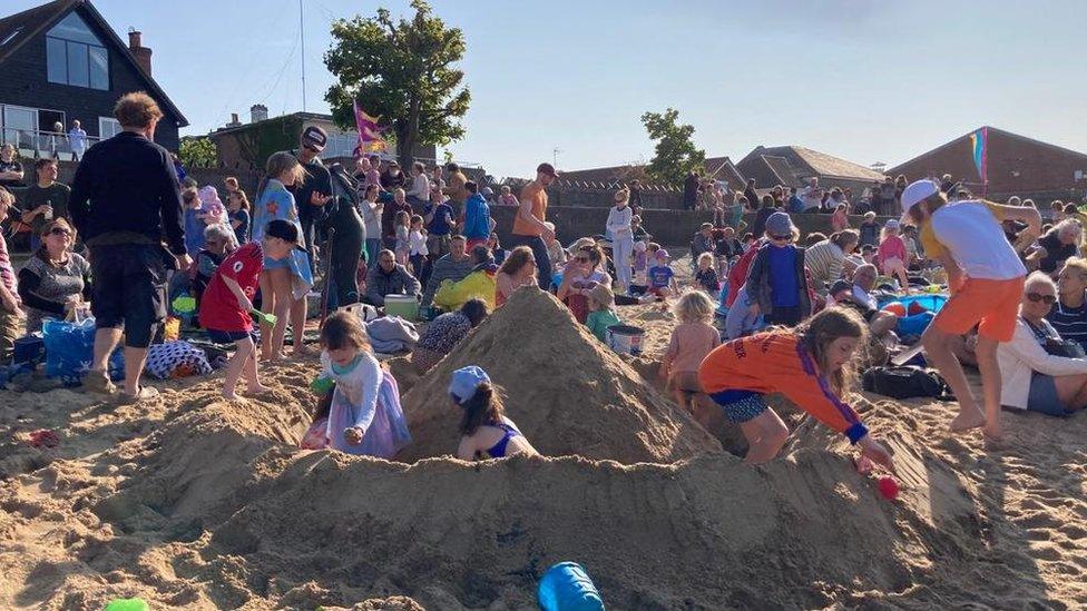 children playing on Manningtree beach