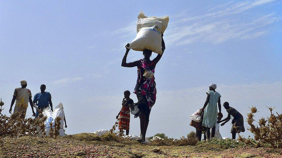 woman carries food