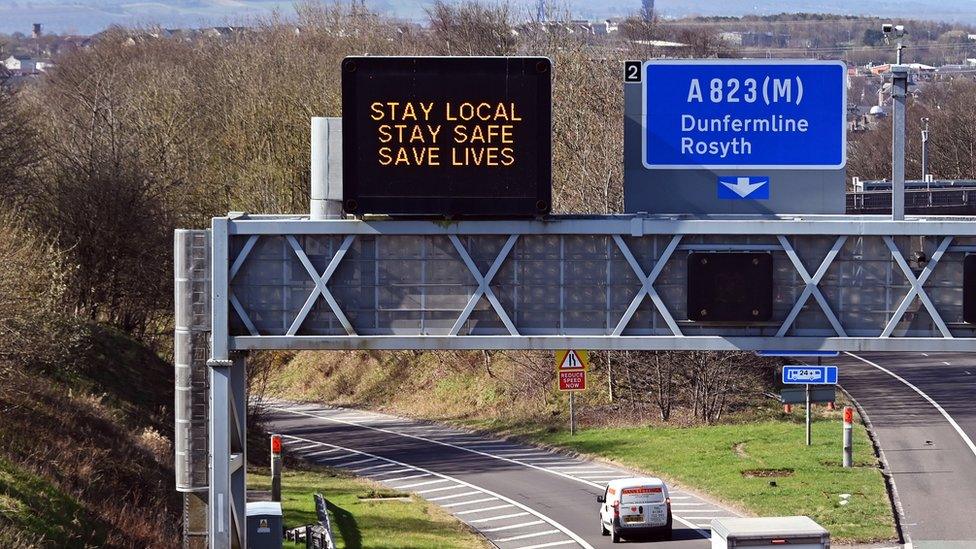 'Stay Local' road sign