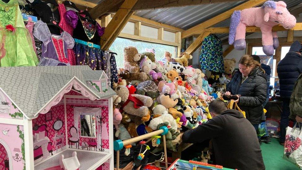 Toys piled on tables