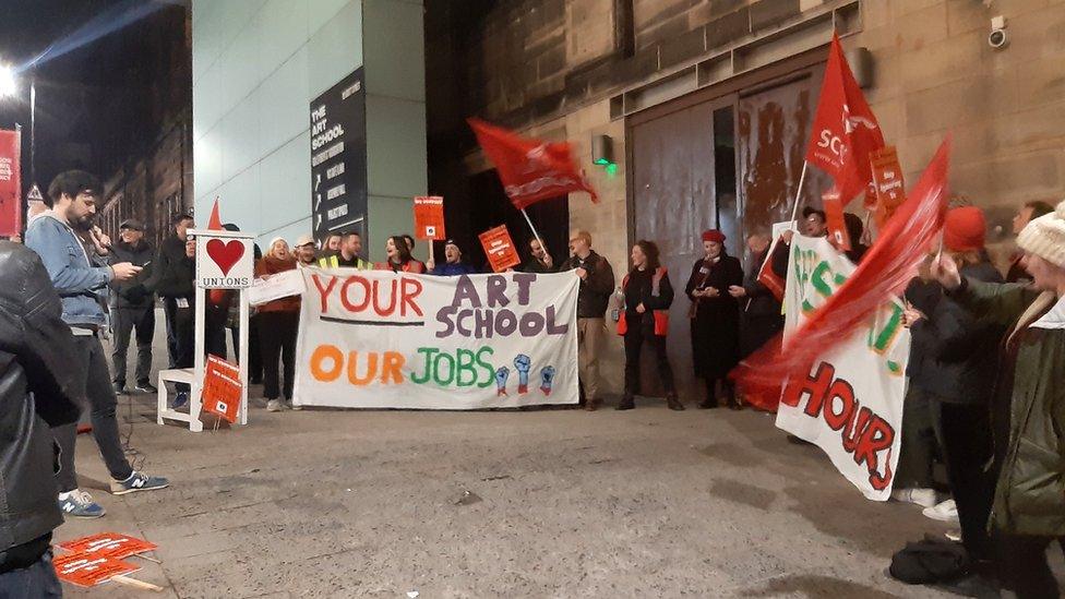 Staff protesting outside the GSASA bar