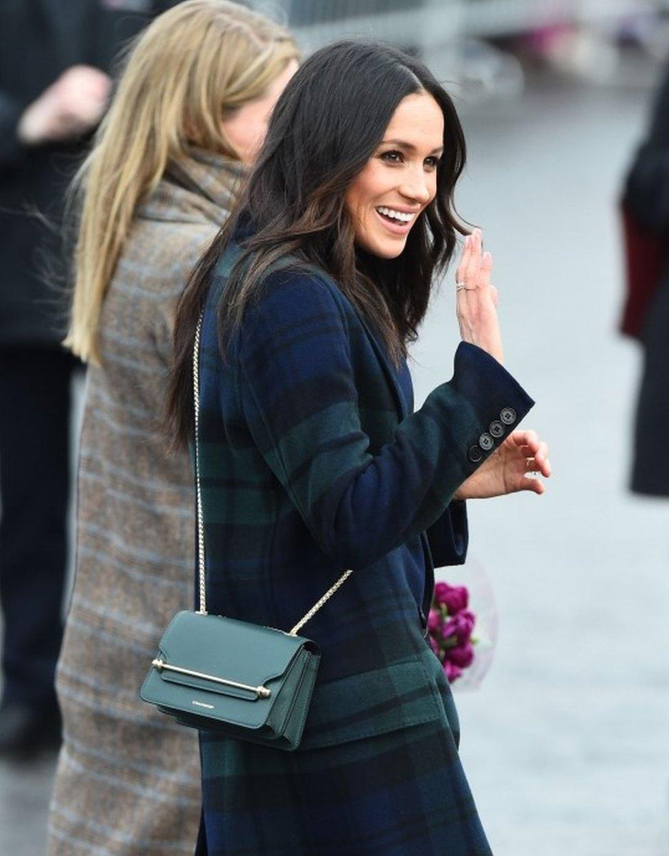 Meghan Markle wore a Burberry coat and a handbag from Edinburgh firm Strathberry