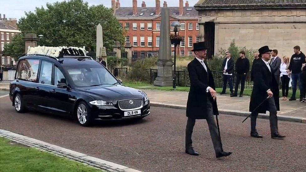 Hearse carrying coffin of Ashley Dale to Liverpool Cathedral