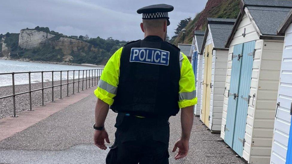 Police officer on patrol in Seaton