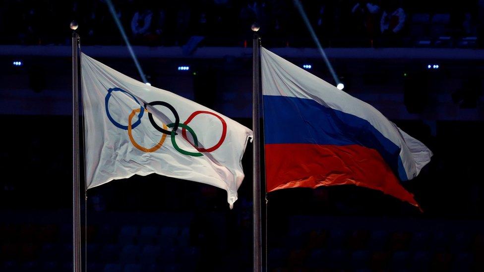 Russian and Olympic flags, file photo