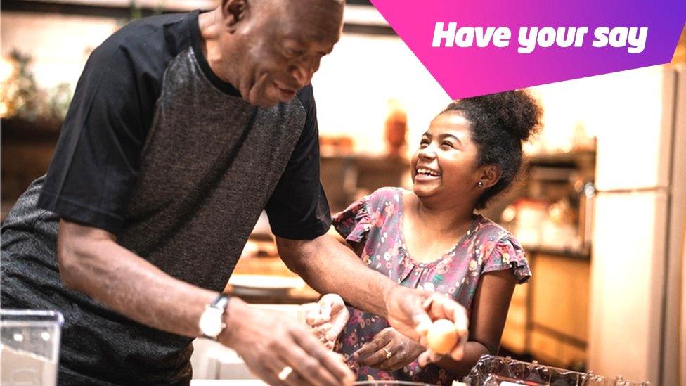 grandparent and child cooking