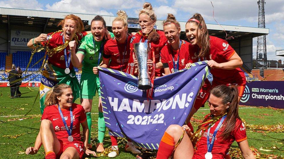 Rachel Furness, Rachael Laws Rhiannon Roberts, Jasmine Mathews, Yana Daniels, Carla Humphrey, Katie Stengel and Leighanne Robe of Liverpool with the Championship Trophy.