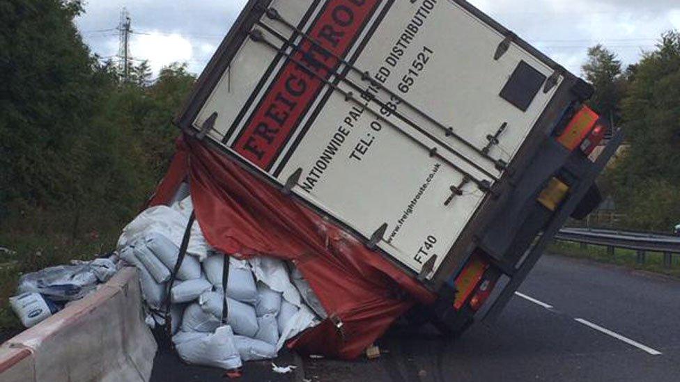 An overturned lorry on the A470