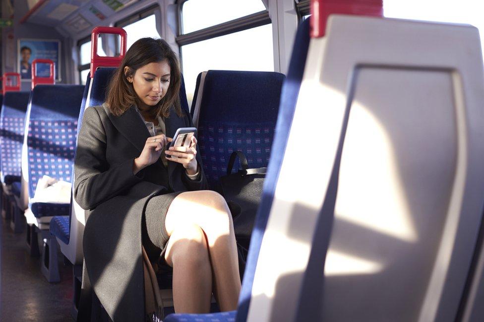 Woman in train alone