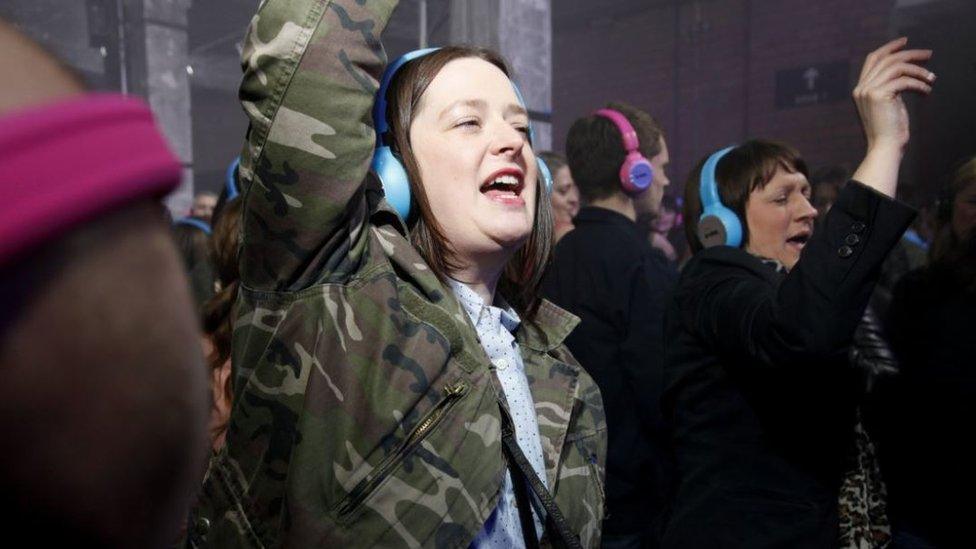 Women attending a silent disco