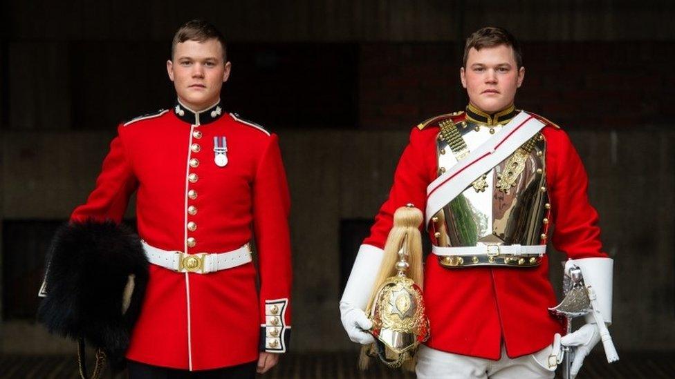 Guardsman Thomas Dell of the Grenadier Guards (left) and his twin brother Trooper Ben Dell of the Household Cavalry