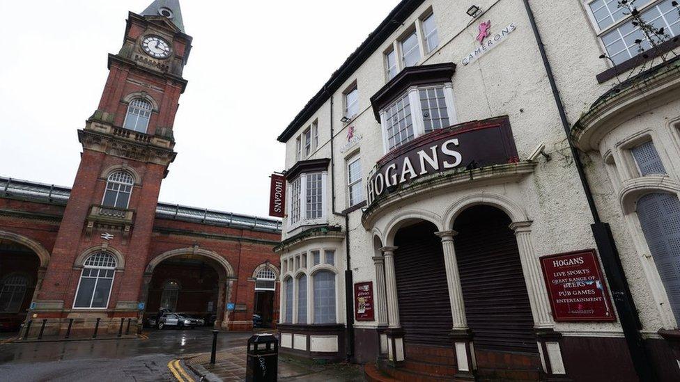 Hogan's sign on former pub next to Bank Top railway station